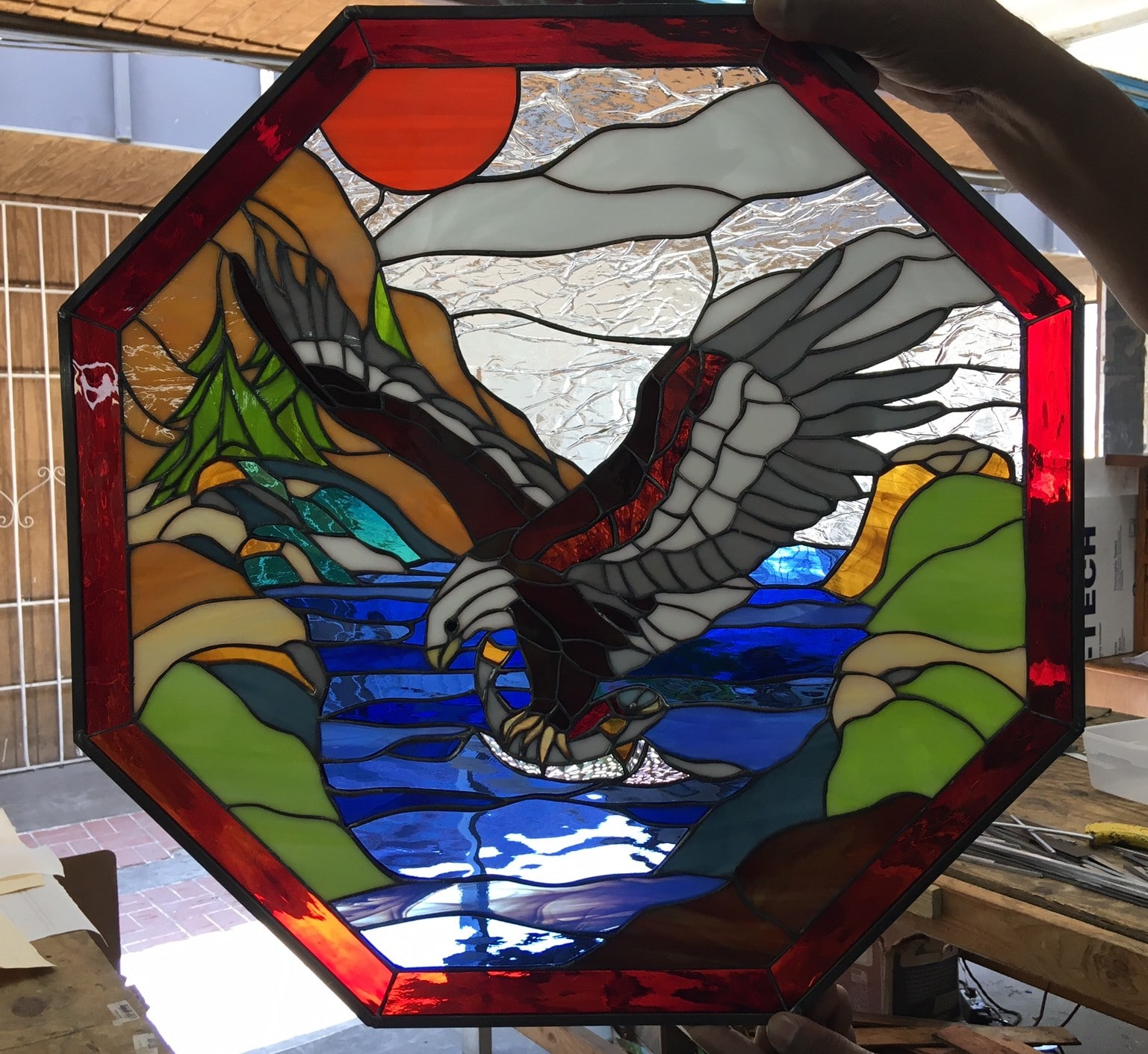 So nice alaskan eagle lake and pine trees stained glass