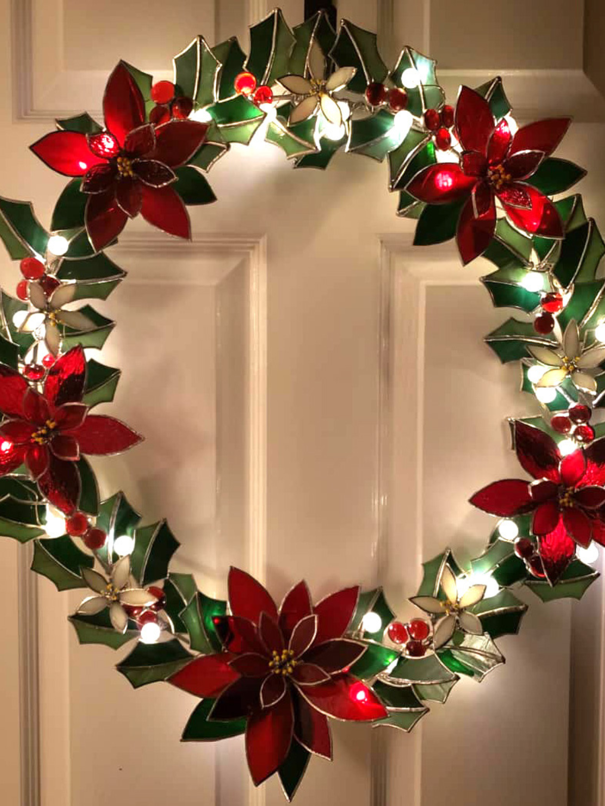 Stained glass poinsettia wreath curious mondo