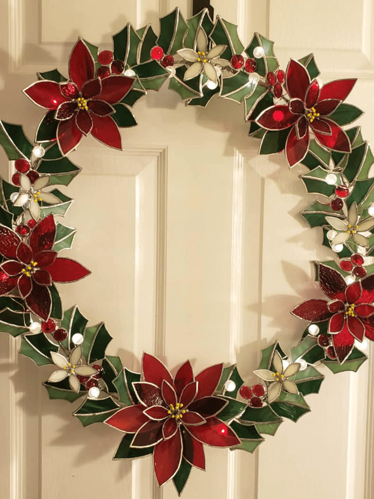 Stained glass poinsettia wreath curious mondo