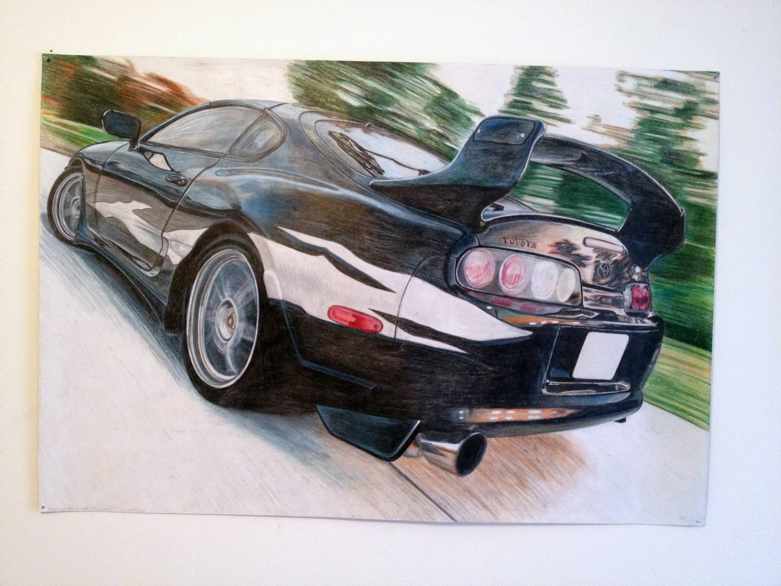 I drew a picture of a toyota supra using colored pencils rpics