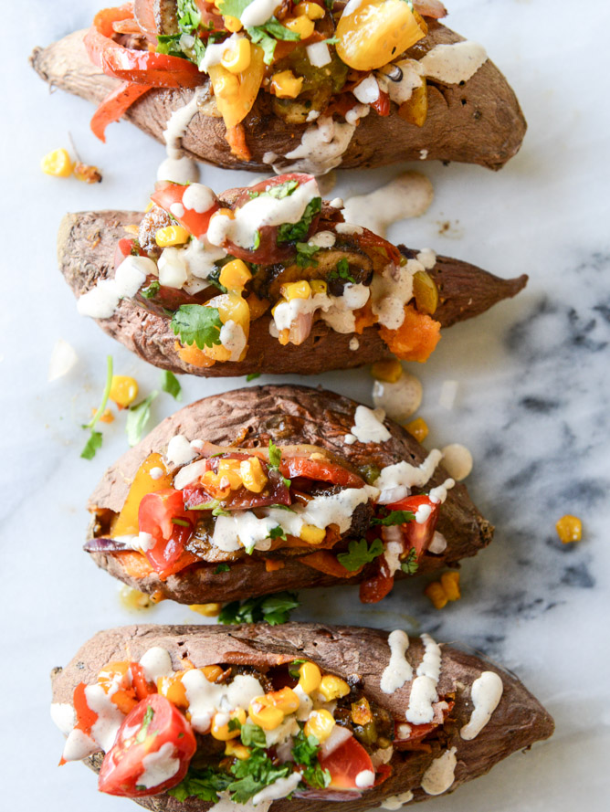 Veggie fajita stuffed sweet potatoes with a chipotle drizzle