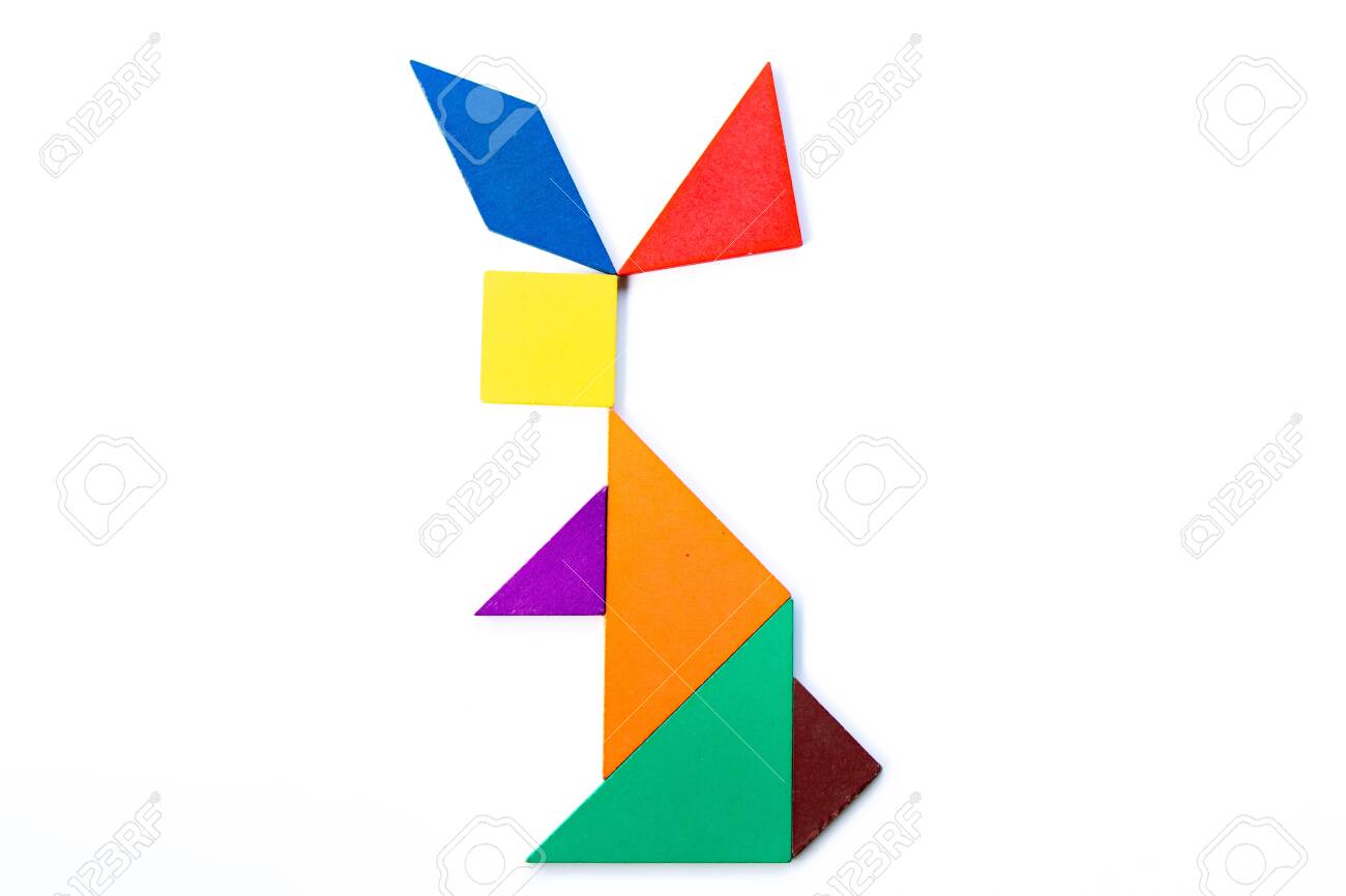 Color wood tangram puzzle in rabbit shape on white background stock photo picture and royalty free image image