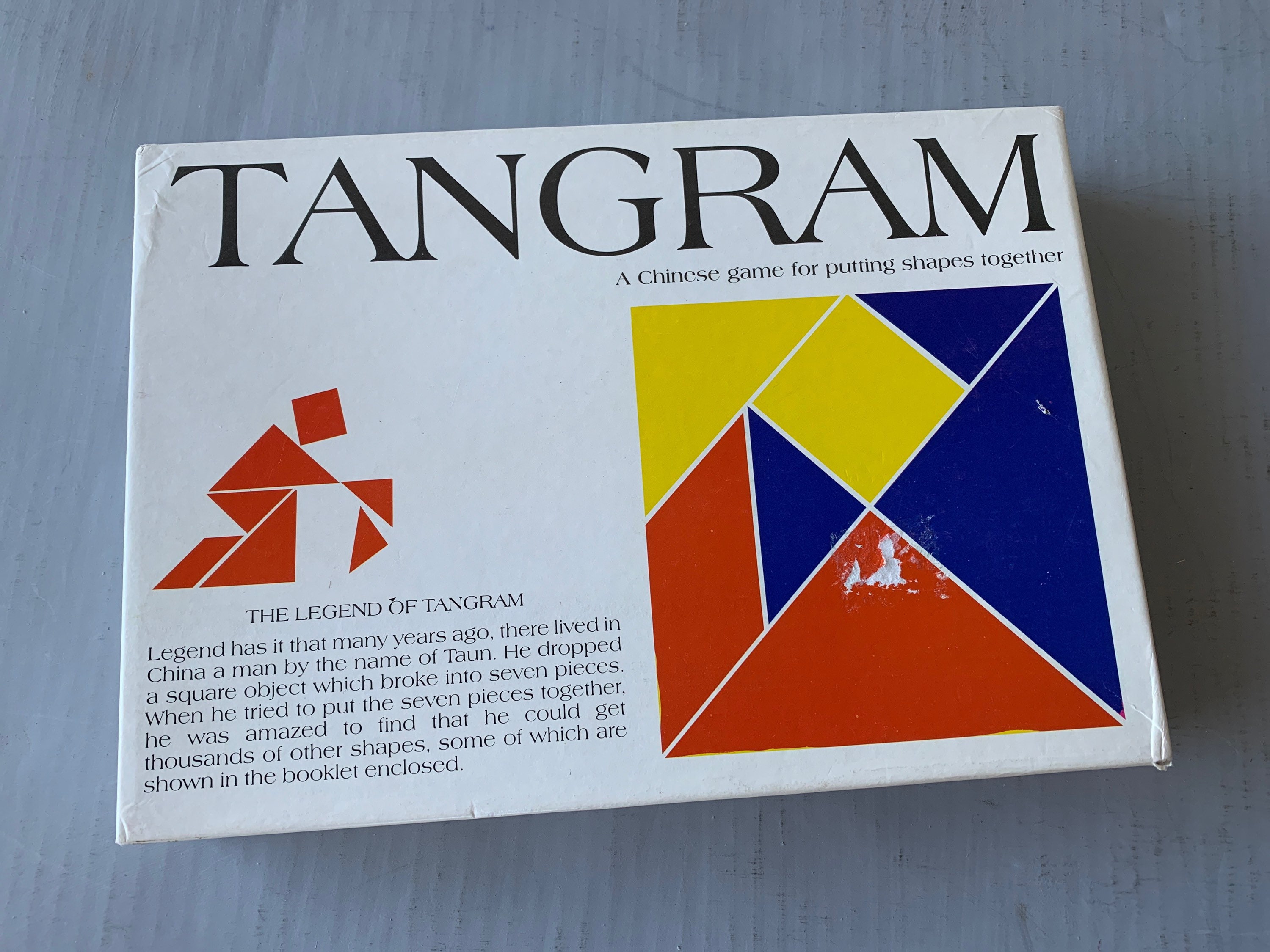 Tangram a chinese game of putting shapes together plete