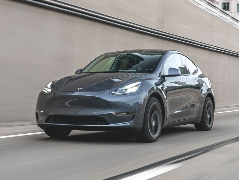 Tesla model y review pricing and specs