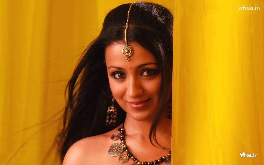 Trisha krishnan smiley face with yellow background hd wallpaper