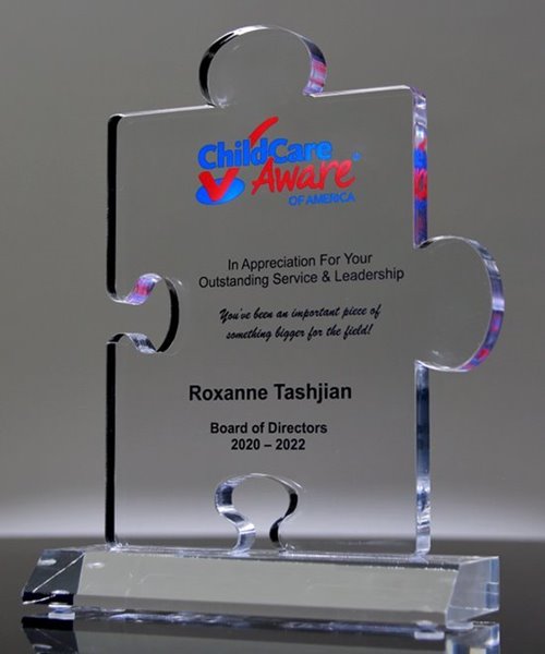 Acrylic puzzle piece trophy with full color imprint awards