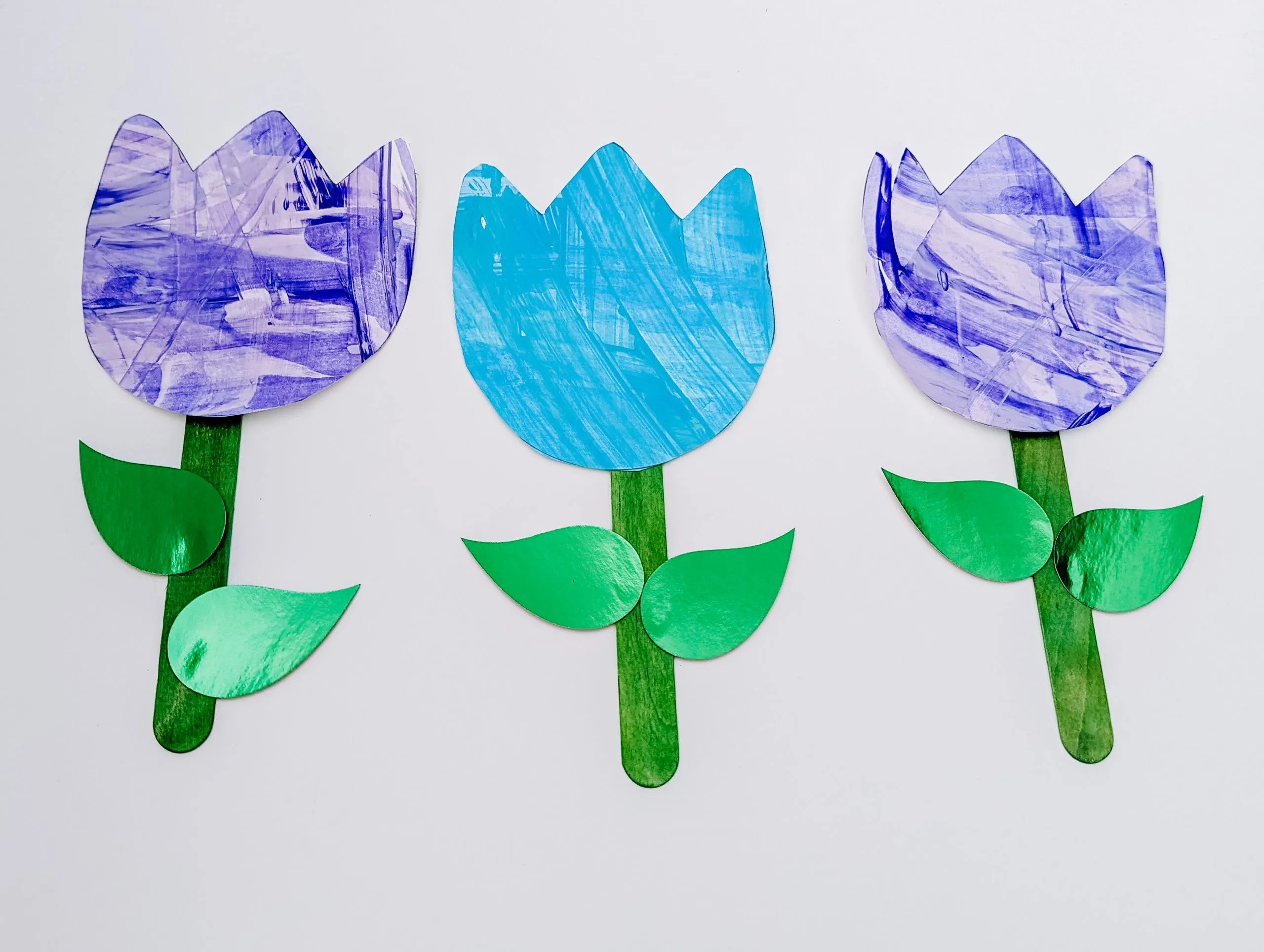 Easy scrape painting tulip that kids will love