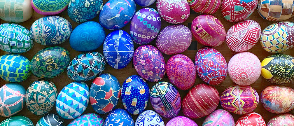 Decorating ukrainian pysanky inspired easter eggs