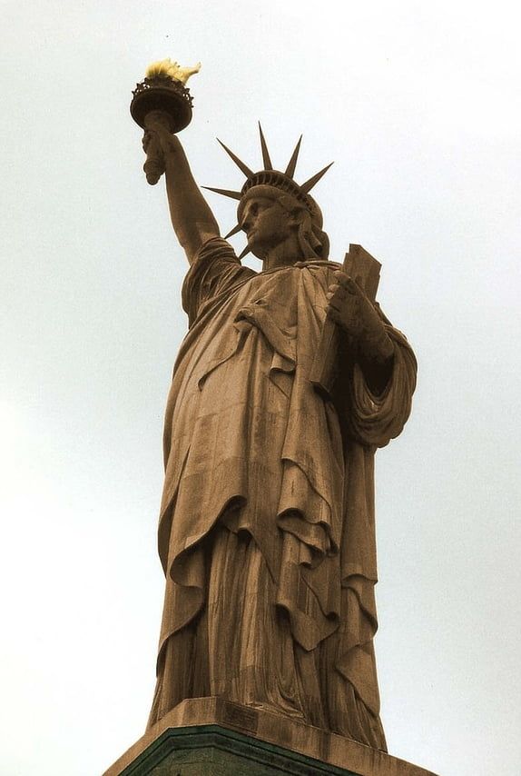 Photo of the statue of liberty before her copper oxidized into the iconic green patina