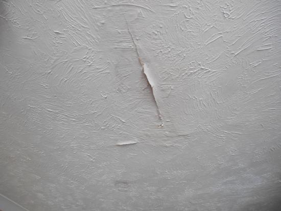 Ceiling damp and wallpaper peeling