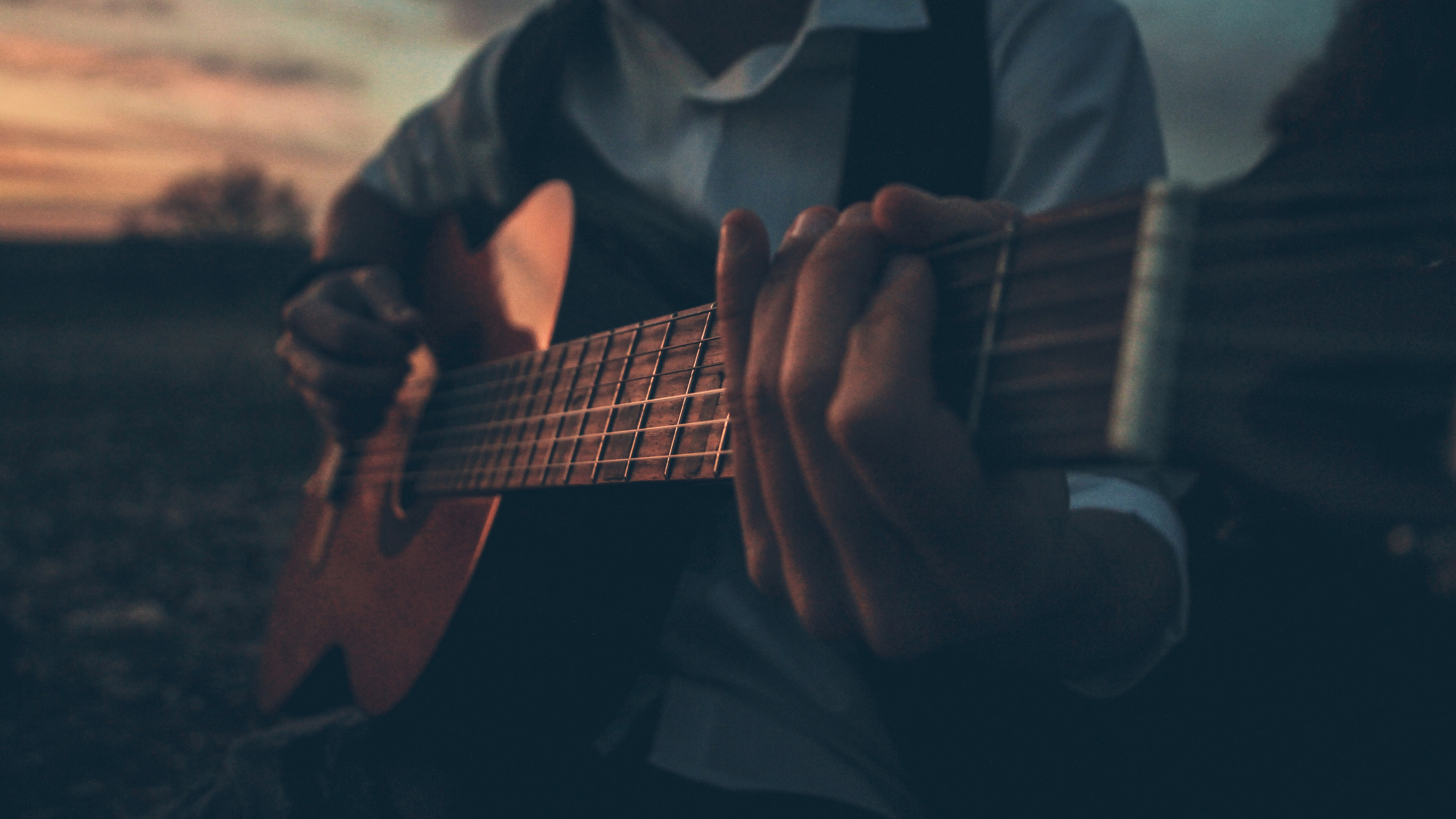 Boy playing guitar outdoors k hd photography k wallpapers images backgrounds photos and pictures