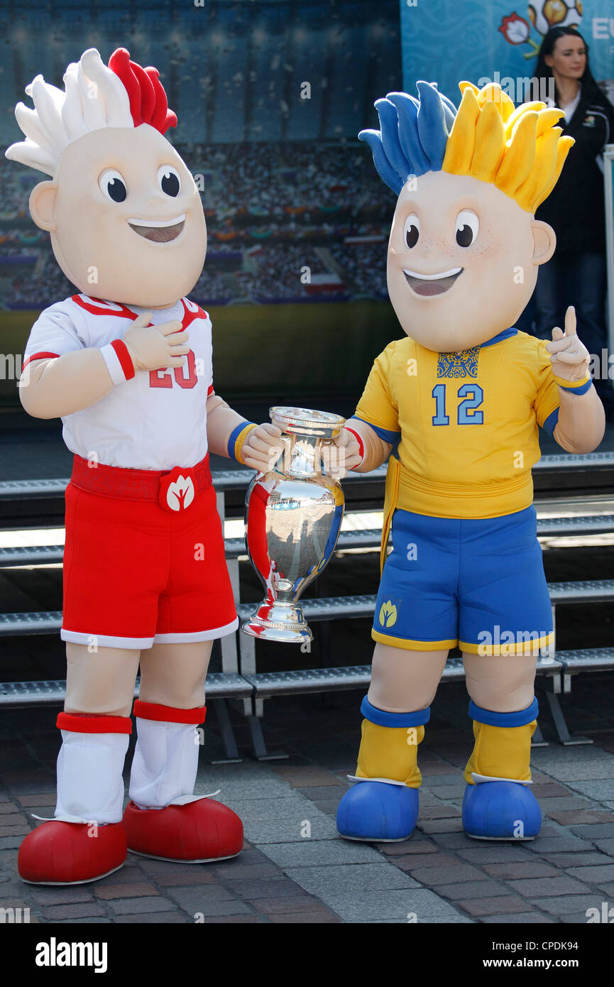 Mascots slavek and slavko hold trophy of euro in krakow poland may ctk photomichal okla stock photo