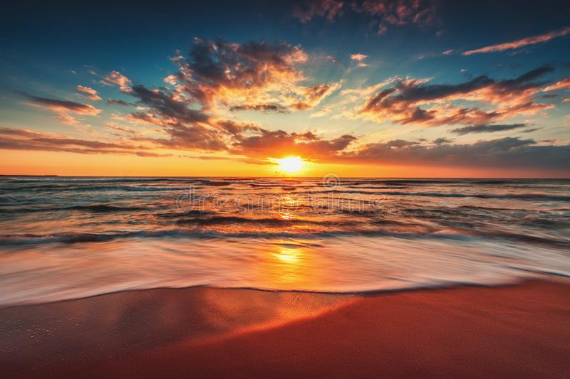 Beautiful sunrise over the sea wallpaper background stock image