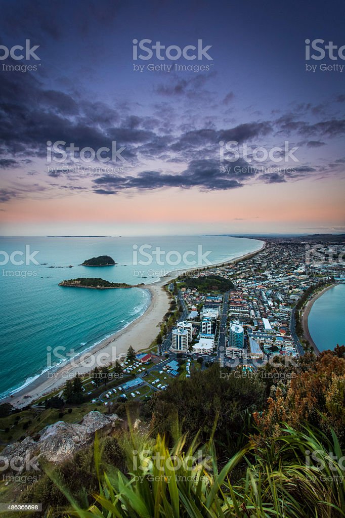 Mount maunganui at sunset vertical stock photo