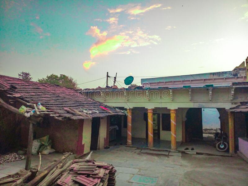 Sky clouds background and village house stock photo