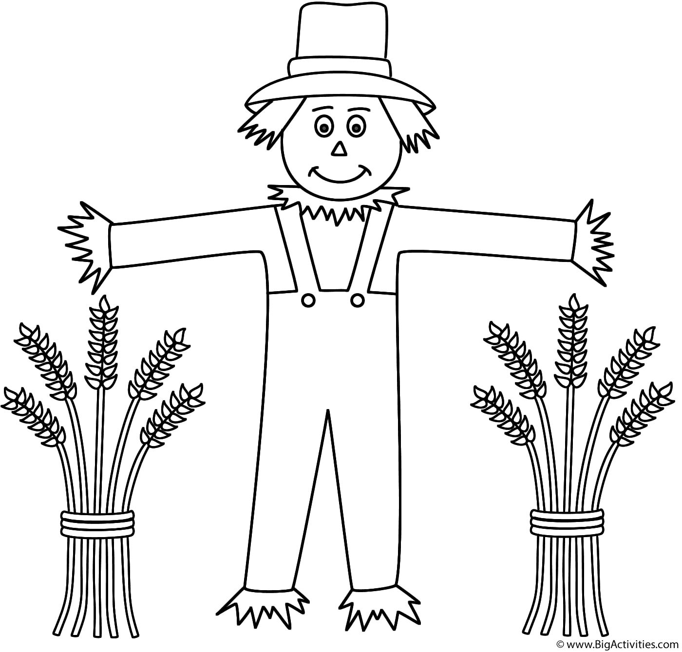 Scarecrow with wheat sheaves