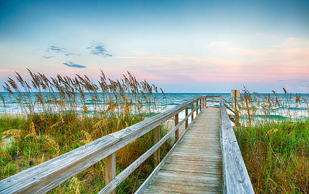 Board walk on the beach stock photo