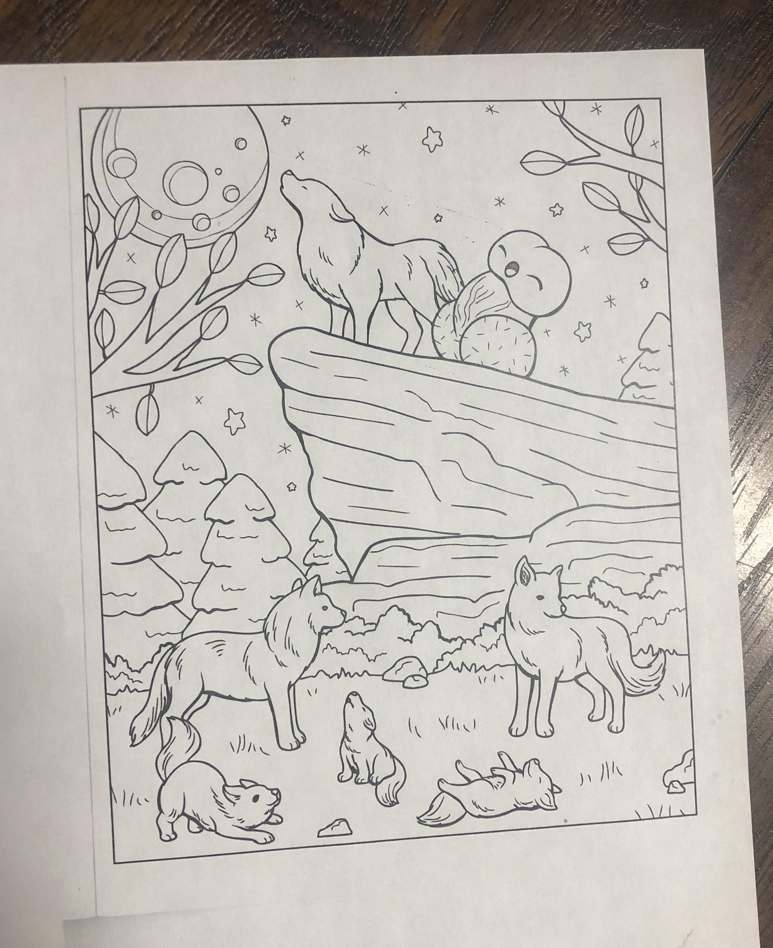 What is that next to the howling wolf on this coloring page rfunny