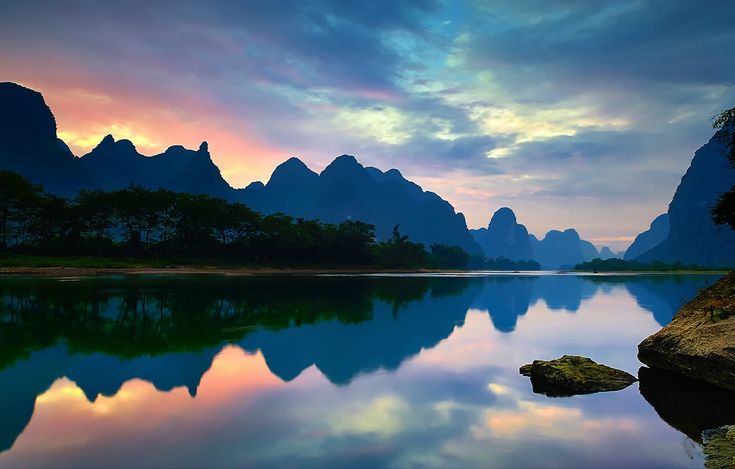 Wallpaper clouds sunset mountains reflection river mirror china guangxi yangshuo karst the lijiangâ landscape wallpaper wave rock mountain photography