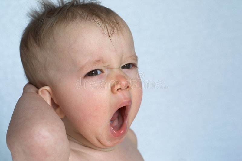 Yawning baby stock photo image of face tiredness small