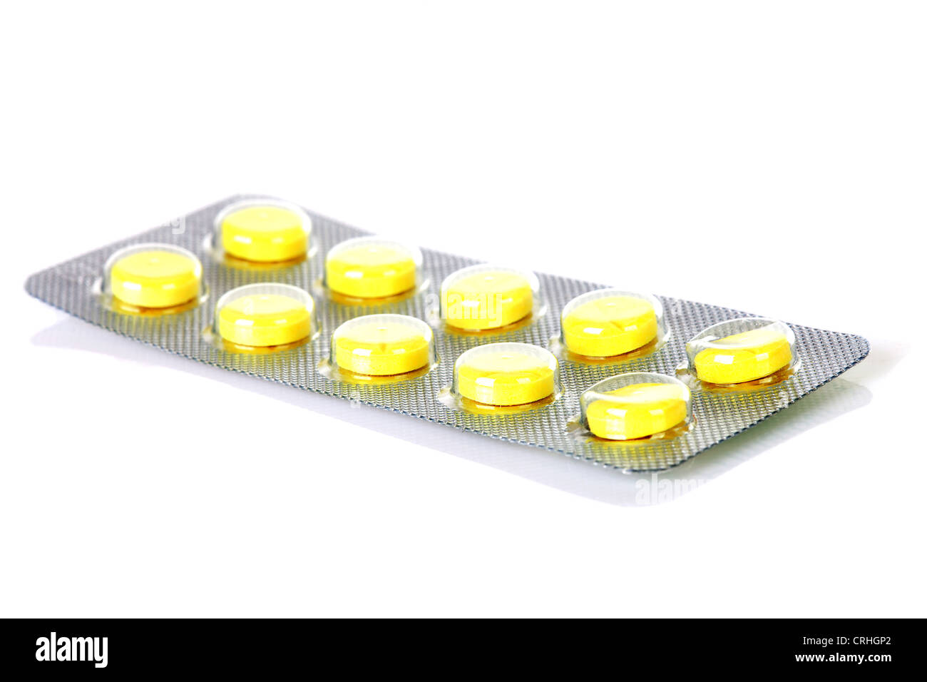 Yellow medicine strip isolated on white background stock photo