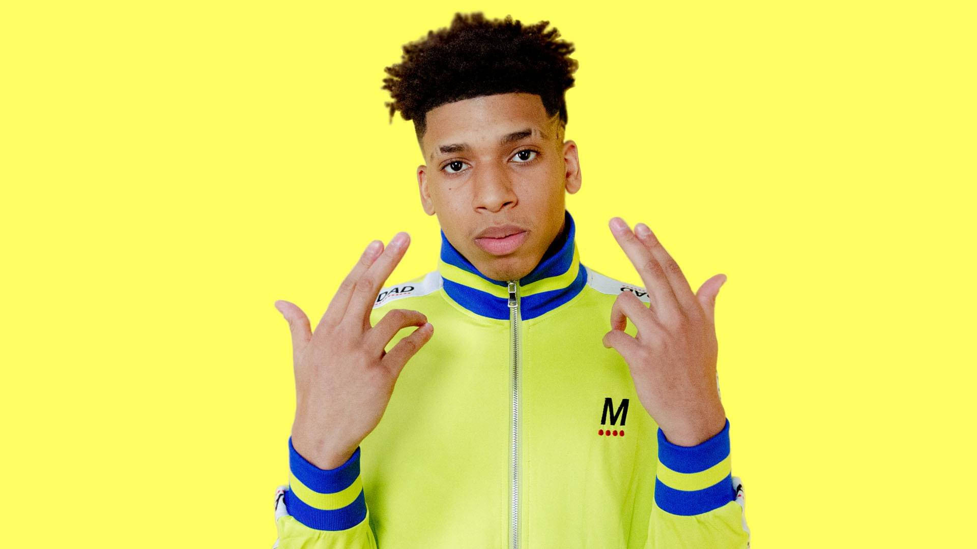 Download rapper nle choppa in yellow wallpaper