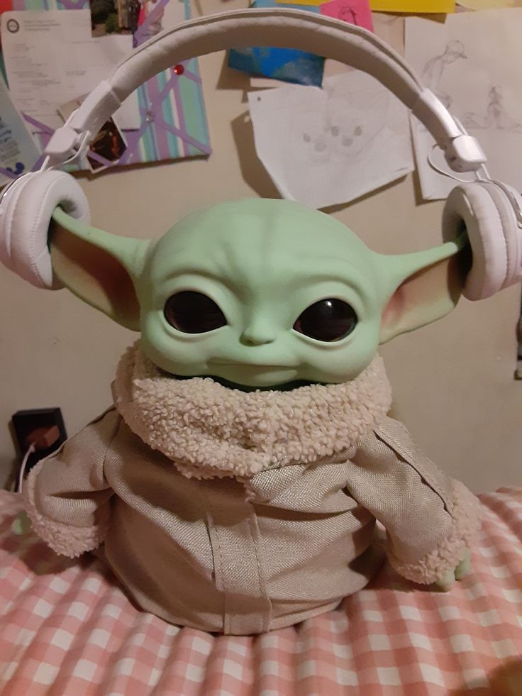 How baby yoda wears headphones yoda wallpaper yoda images star wars characters yoda