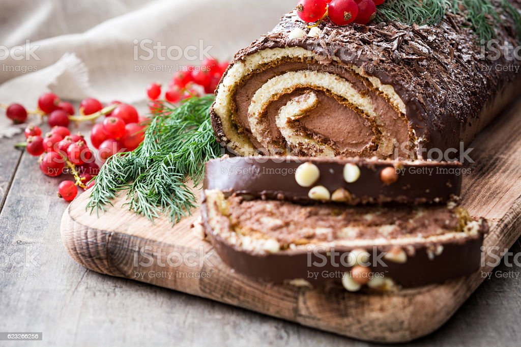 Chocolate yule log cake stock photo