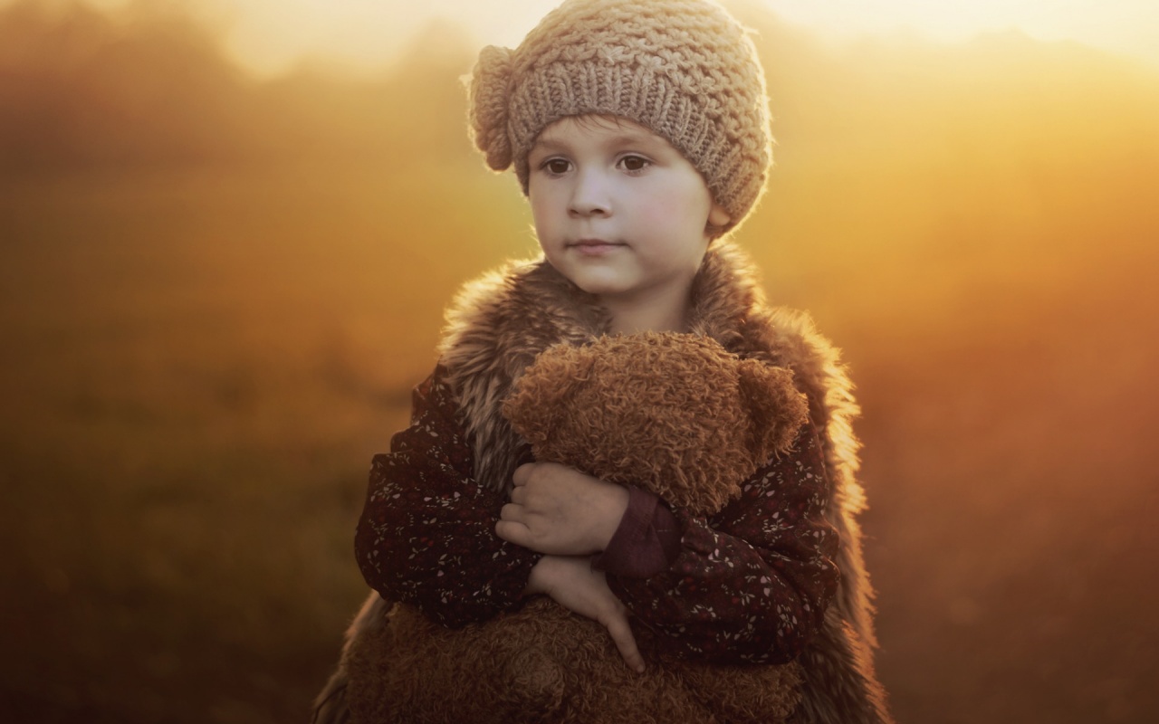 a girl with teddy bear